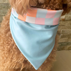 Reversible dog bandana with colorful pink, blue, cream, and orange checkered print lightweight, breathable, and handmade in Puerto Rico.