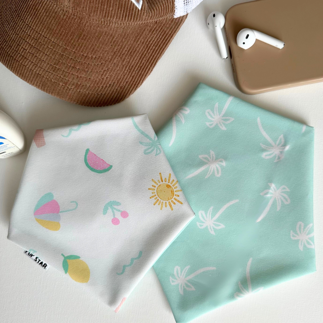 Reversible summer dog bandana with playful beach-themed prints — waterproof, lightweight, and perfect for sunny adventures.