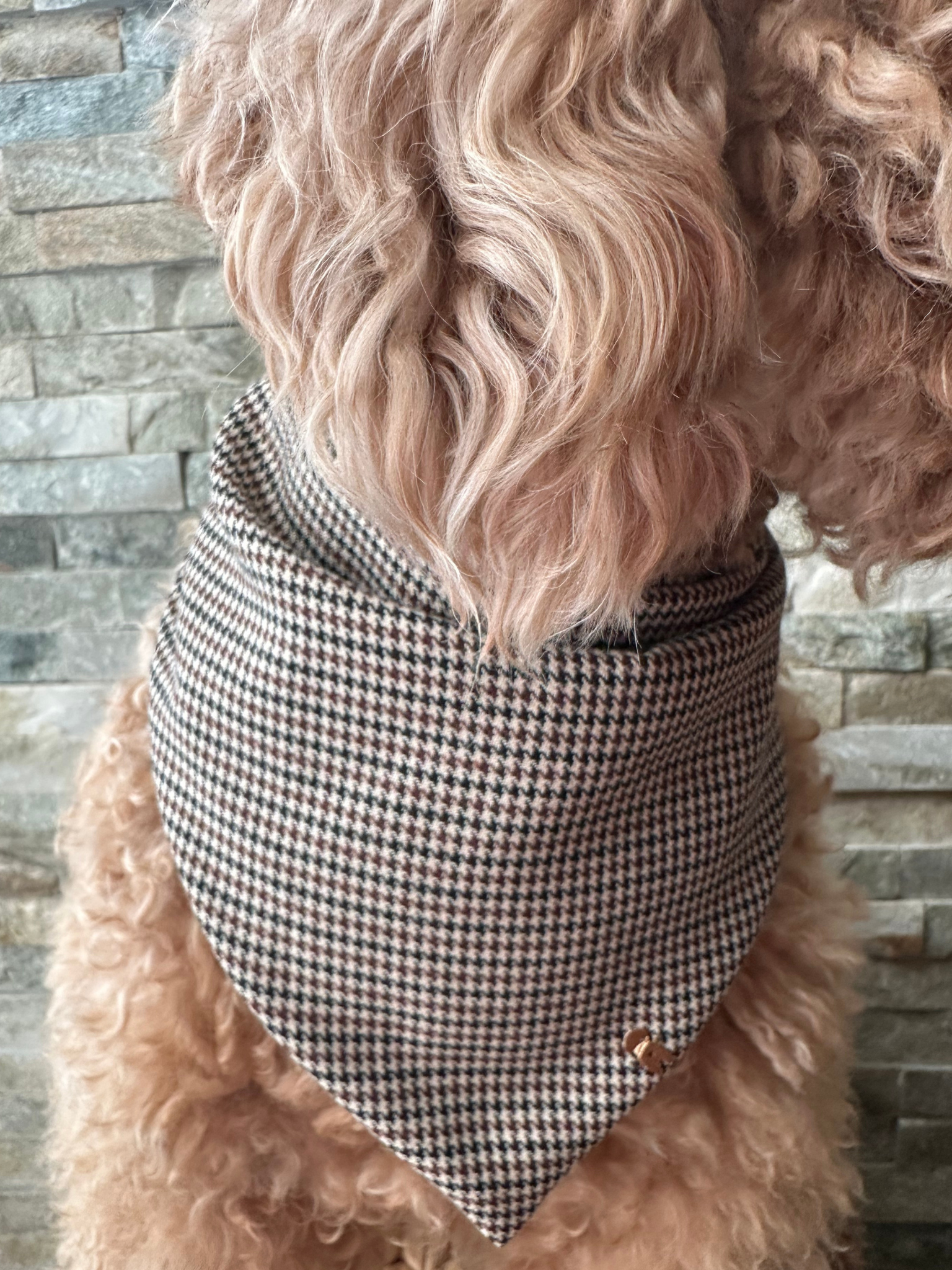 Elegant brown and cream houndstooth dog bandana made of soft cotton for a classic, comfortable, and stylish look. Perfect for standout pups.